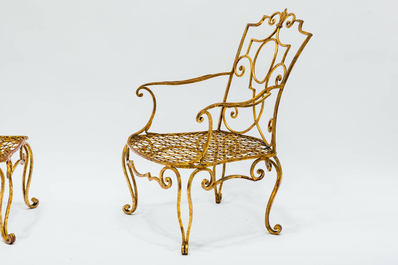 1940s French moderne gilt chair and ottoman by Jean-Charles Moreux. 

Dimensions are of the chair. Ottoman is 17.5