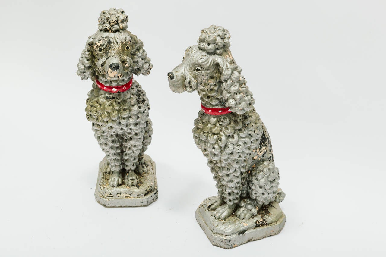 Who needs lions guarding your house when you can have these great 1950's poodles protecting you. Great patina.