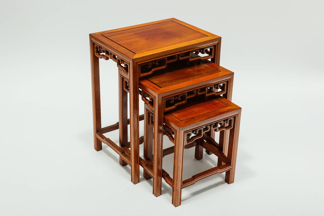 Set of 3 Asian modern teak nesting tables.