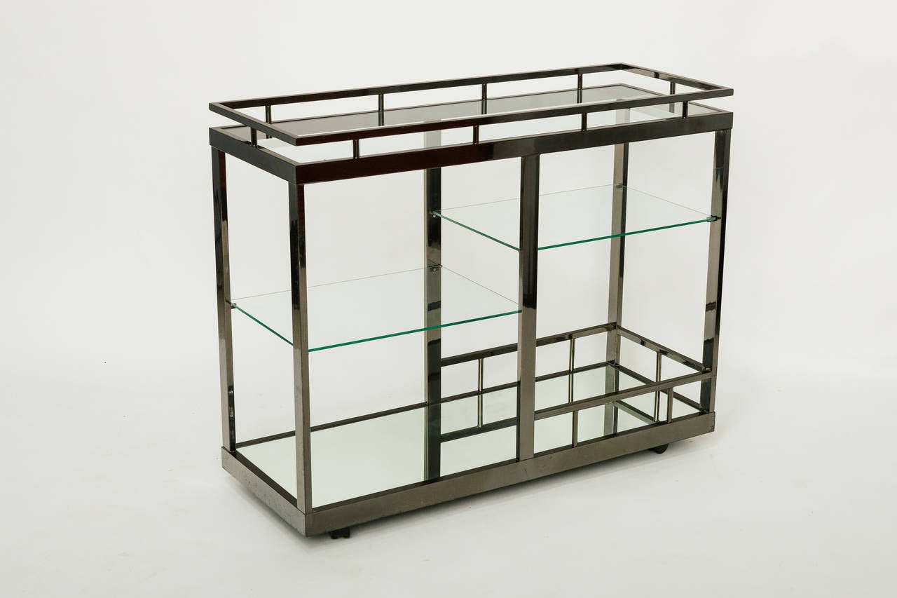 Chic oversized serving cart, with glass shelves.