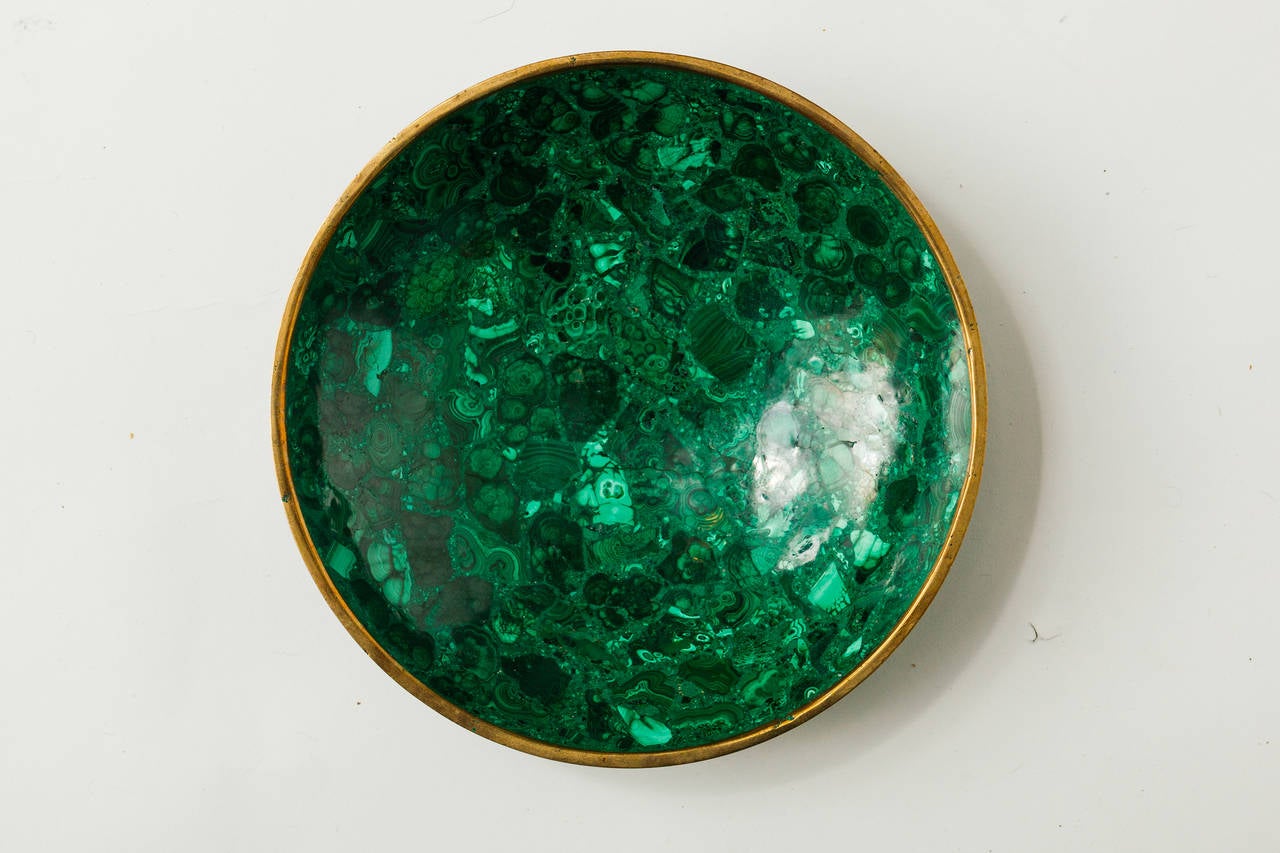 Handcrafted malachite bowl. Bowl has slight age crack but is sound.