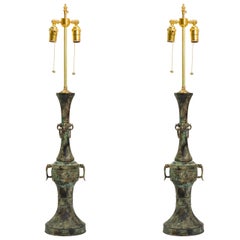 Paire de lampes de table en bronze patiné