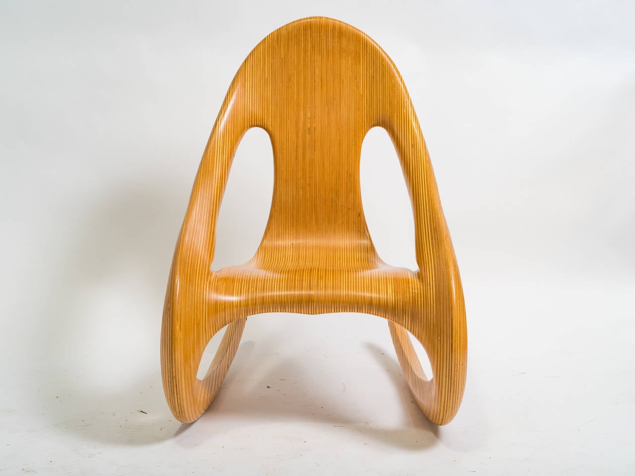 Very cool shaped rocker signed Carl Gromoll. It is dated 4/1983. Made of layered laminated birch.