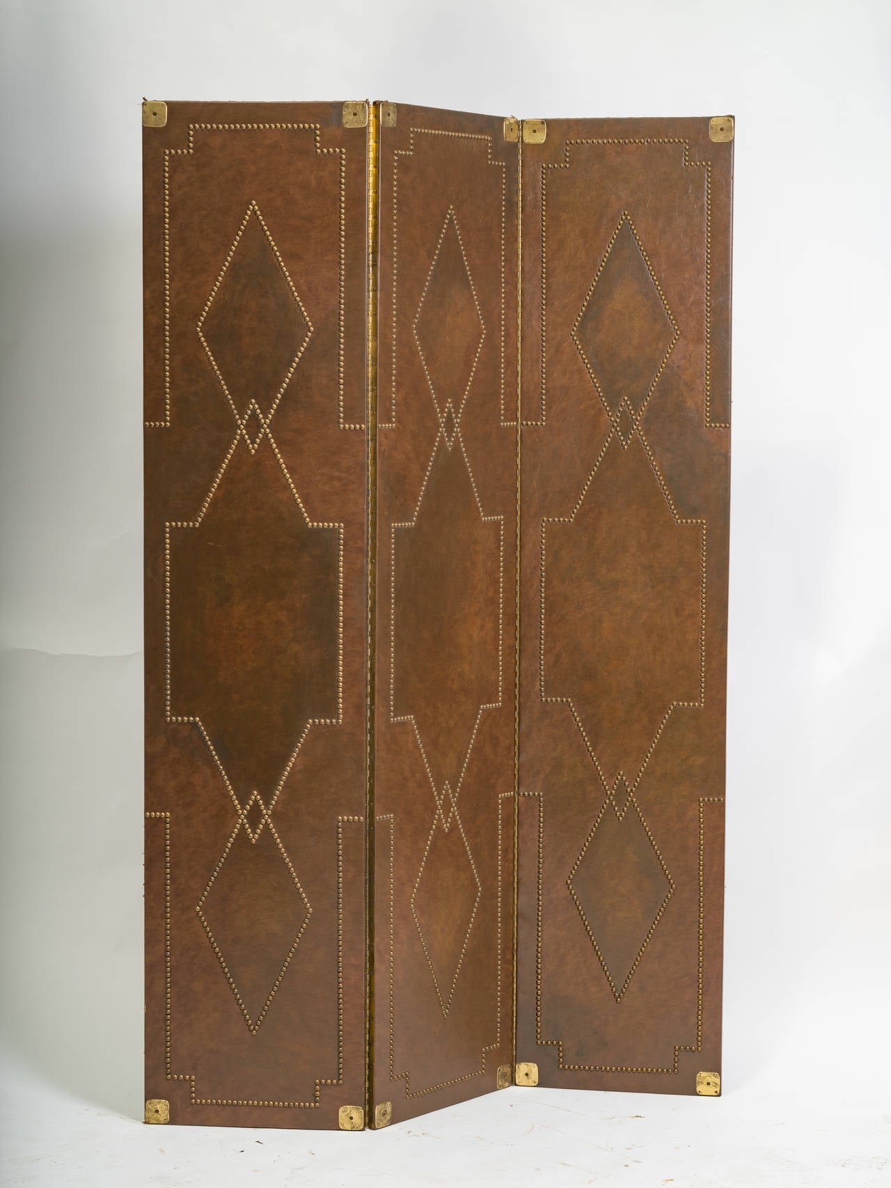 Leather  and brass  nail head room divider or screen.