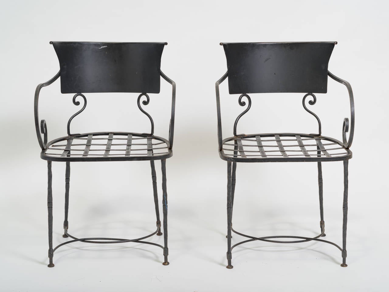 Six Italian iron chairs purchased from Bloomingdales in the early 1980s. Curvy, and heavy!
