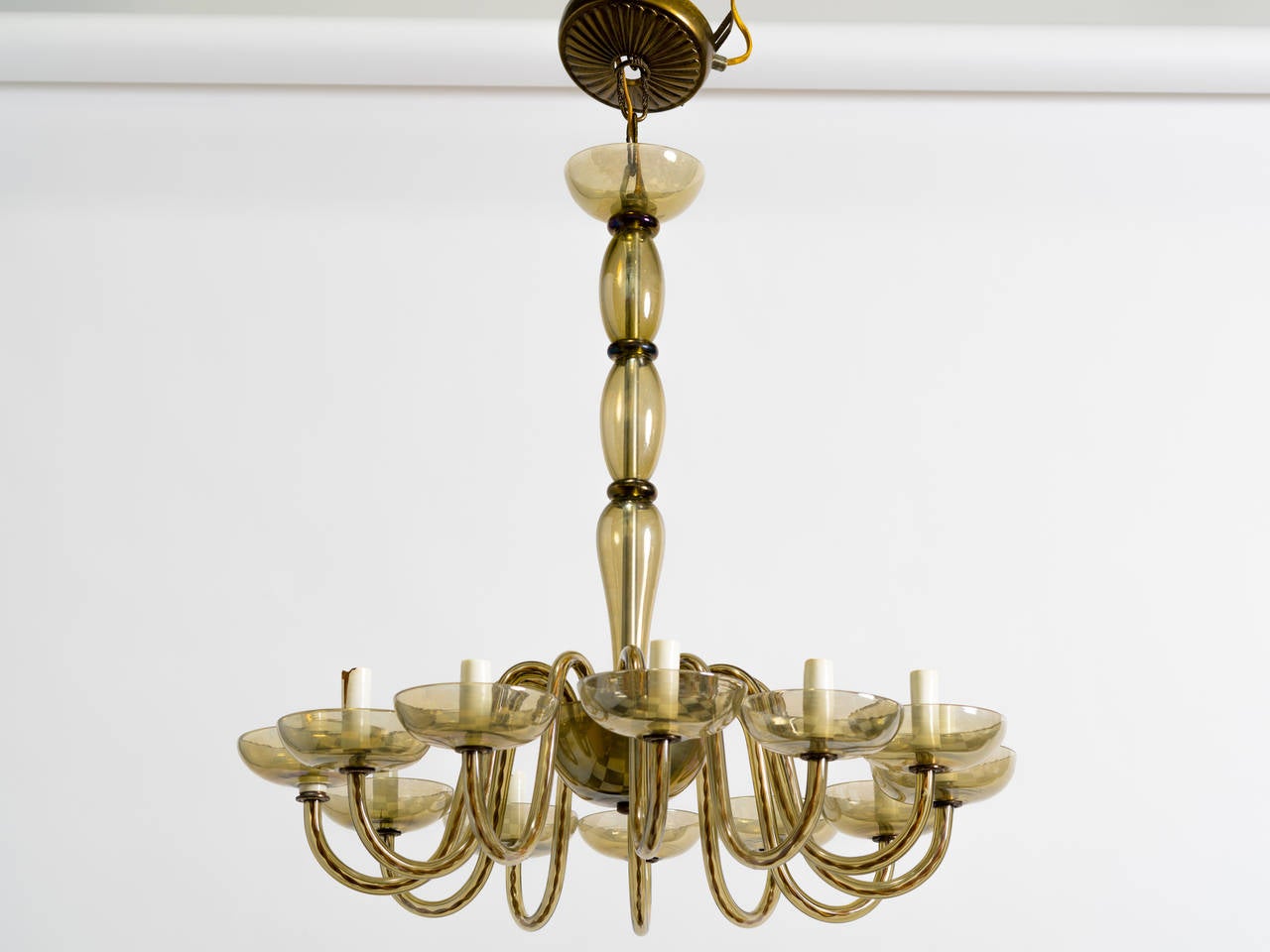 Its rare to see so many arms on a fixture this size. Murano glass fixture from the 1970s.