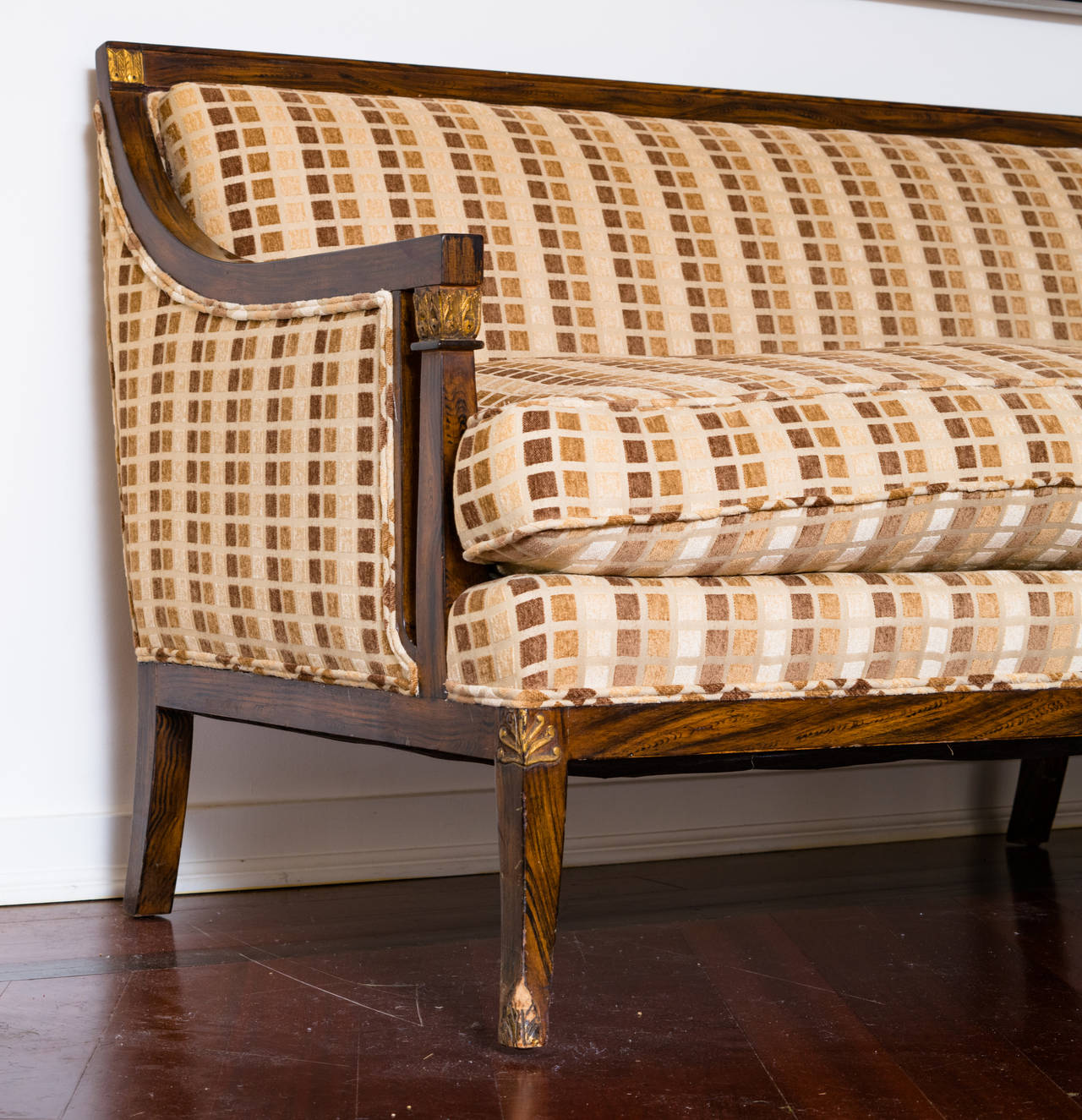 Newly upholstered 1940s rosewood classical sofa.