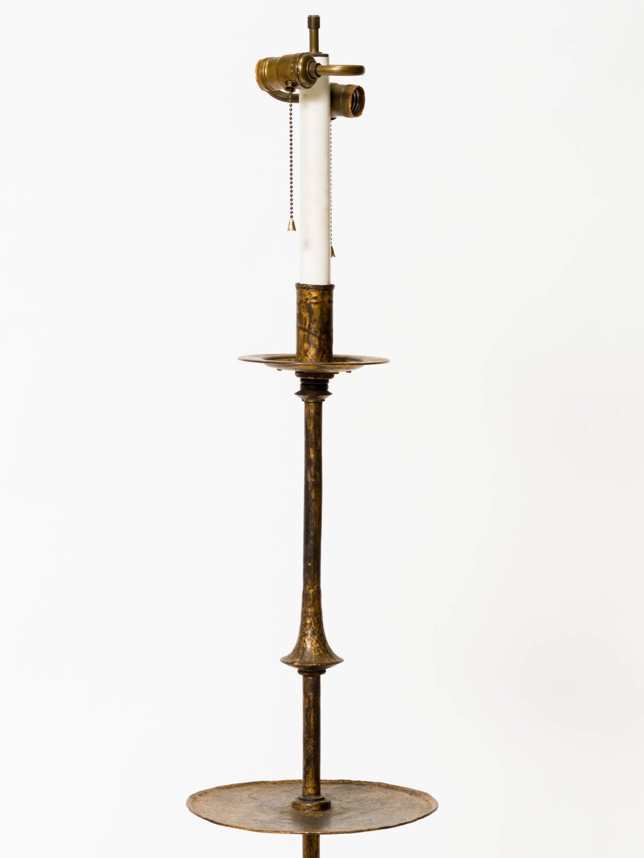 Sculptural gilt iron floor lamp from the 1960s.