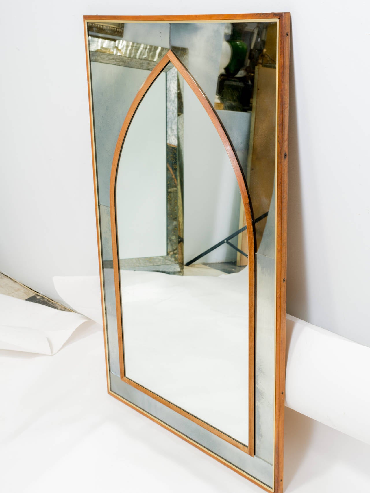 Nice wall mirror in the Moorish style. Teak framed. There is a nick in the mirror on the bottom right. The pictures do not show this, If interested, we will send a picture.