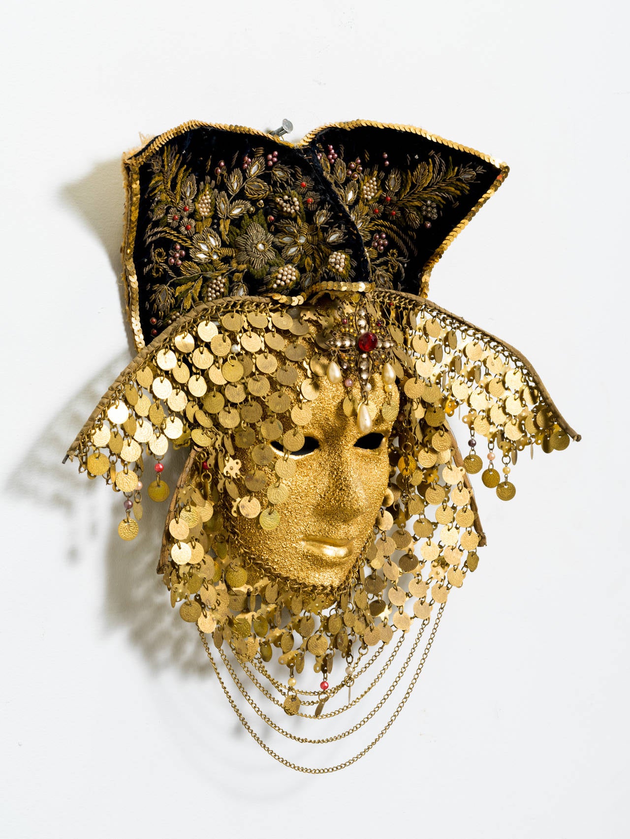 Elaborate carnival masquerade.
Full face comprised of sequins, paste stones and others.