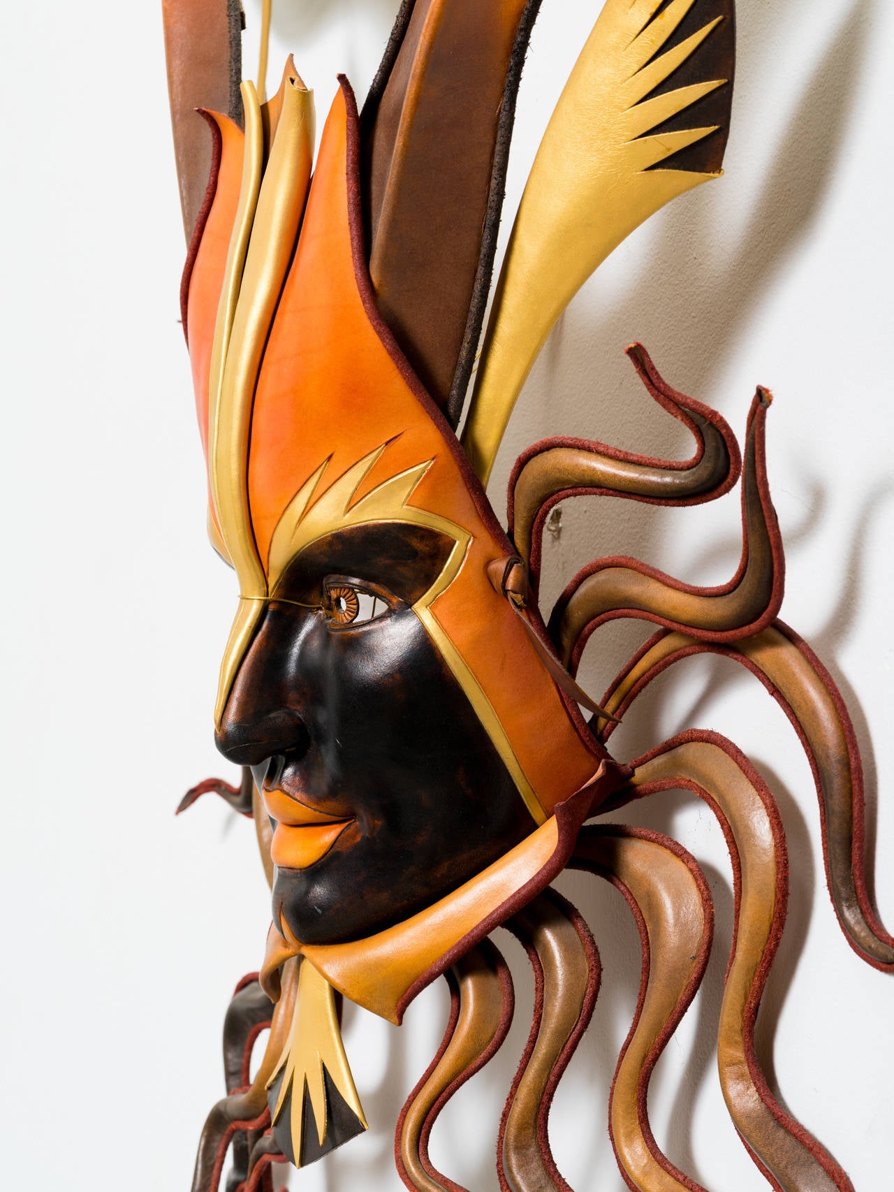 Elaborate carnival masquerade.
Full face made of dyed leather.
Signed.