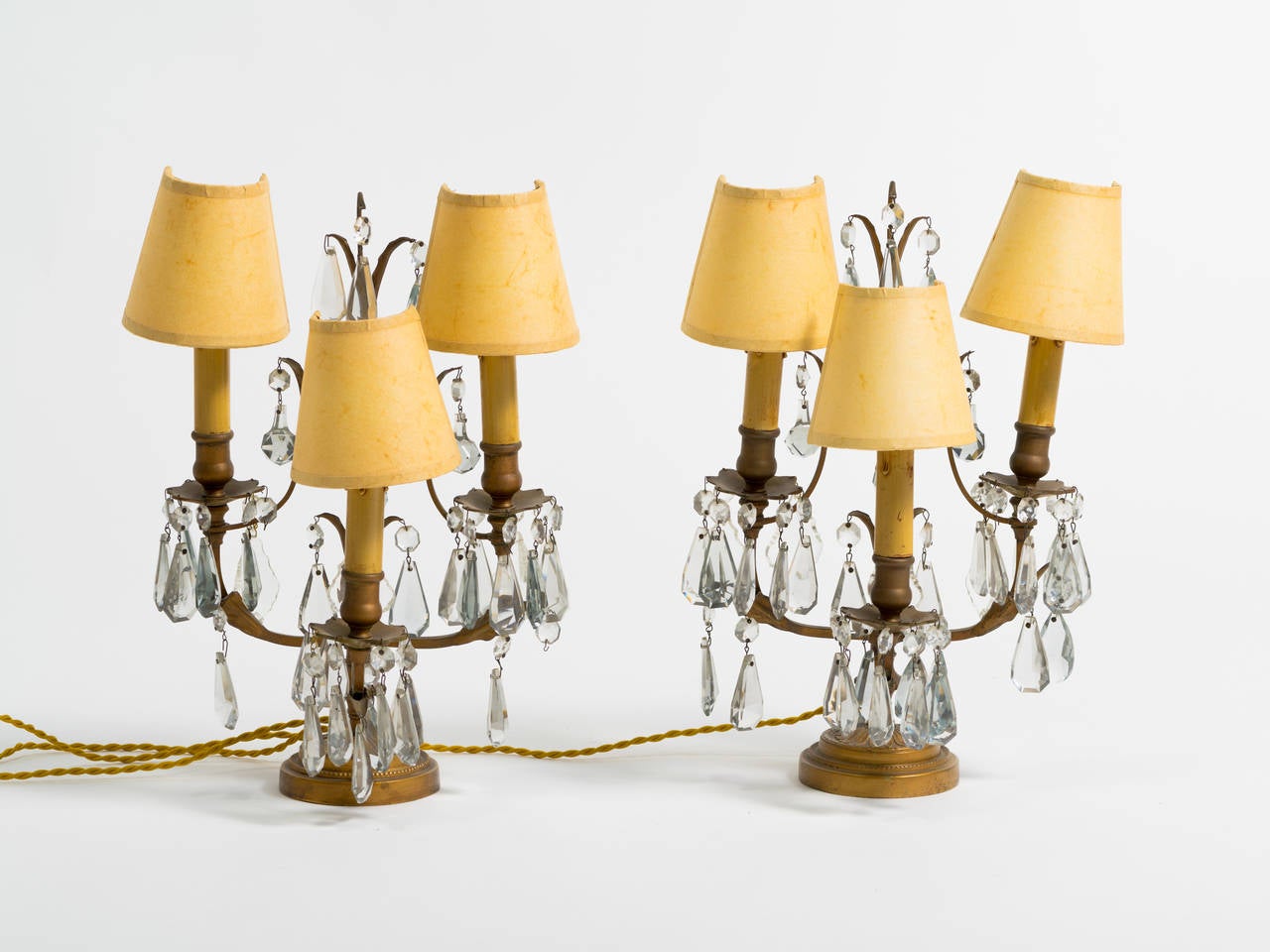 French bronze and crystal candelabra lamps from the 1940s.