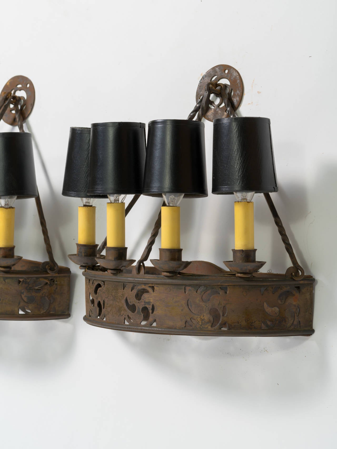 Great pair of 1920s half circle gothic sconces.