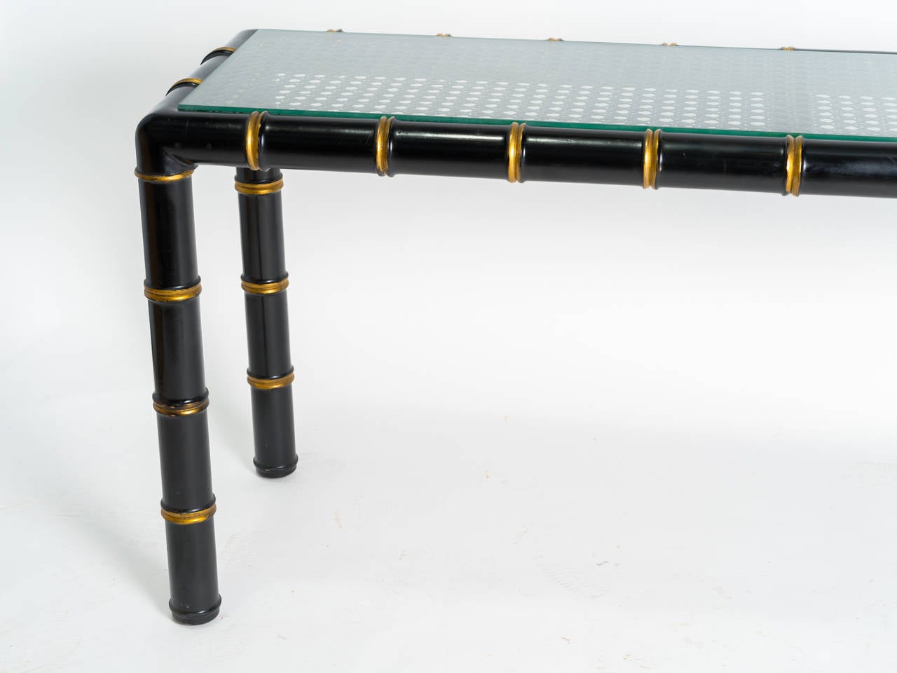 Asian style thick faux bamboo style wood console with glass top. Factory painted black with gold trim.