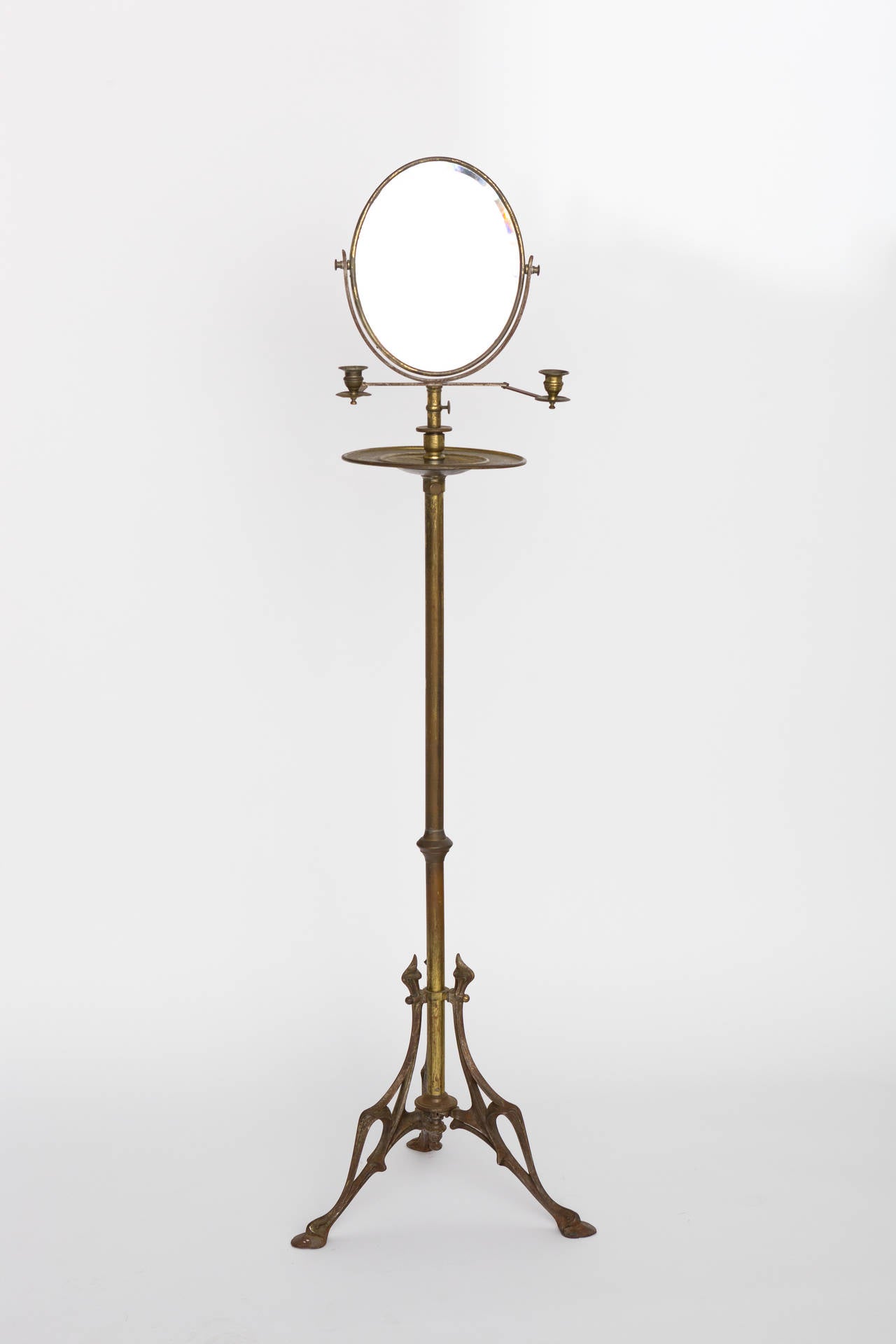 Turn of the century English brass shaving mirror - would be so cool it a man's bathroom. The mirror extends another 18 inches , from it's base, making the full length 78inches.