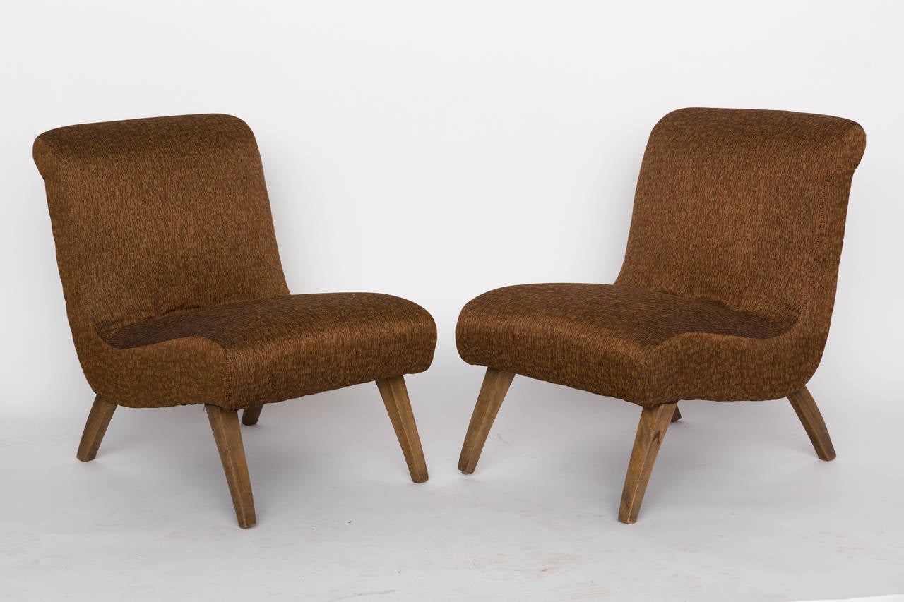 Sexy 1940s slipper chairs, newly upholstered.