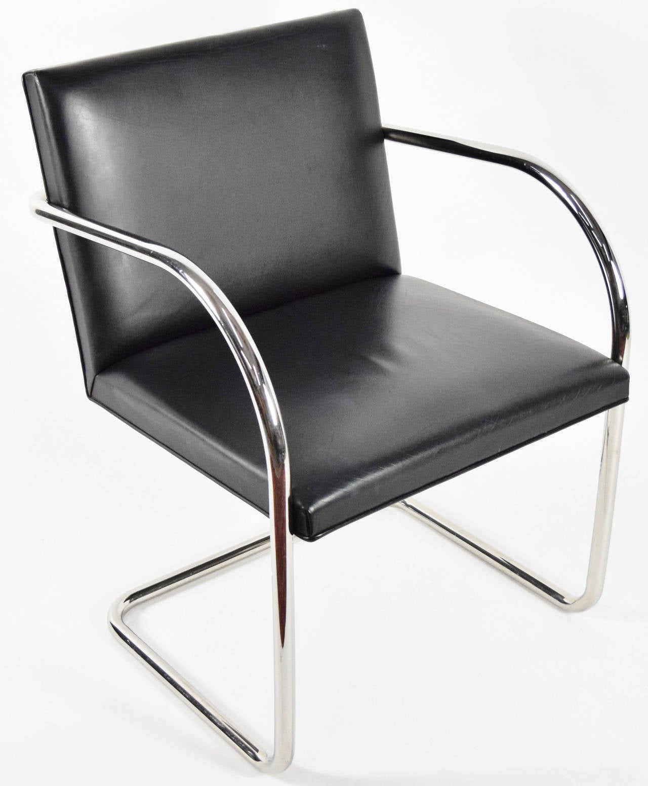 Tubular Brno chair in black leather by Knoll. Chair is chrome plated stainless steel.