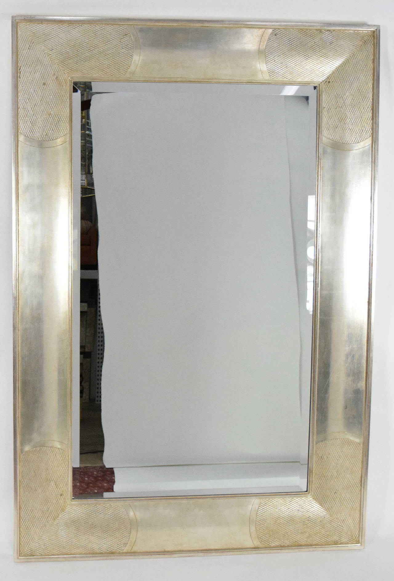 This is the English II mirror by Sally Sirkin Lewis for J. Robert Scott. It is in a silver leaf finish. The mirror came from a Palm Springs estate. Original net pricing on mirror is $9,000+.