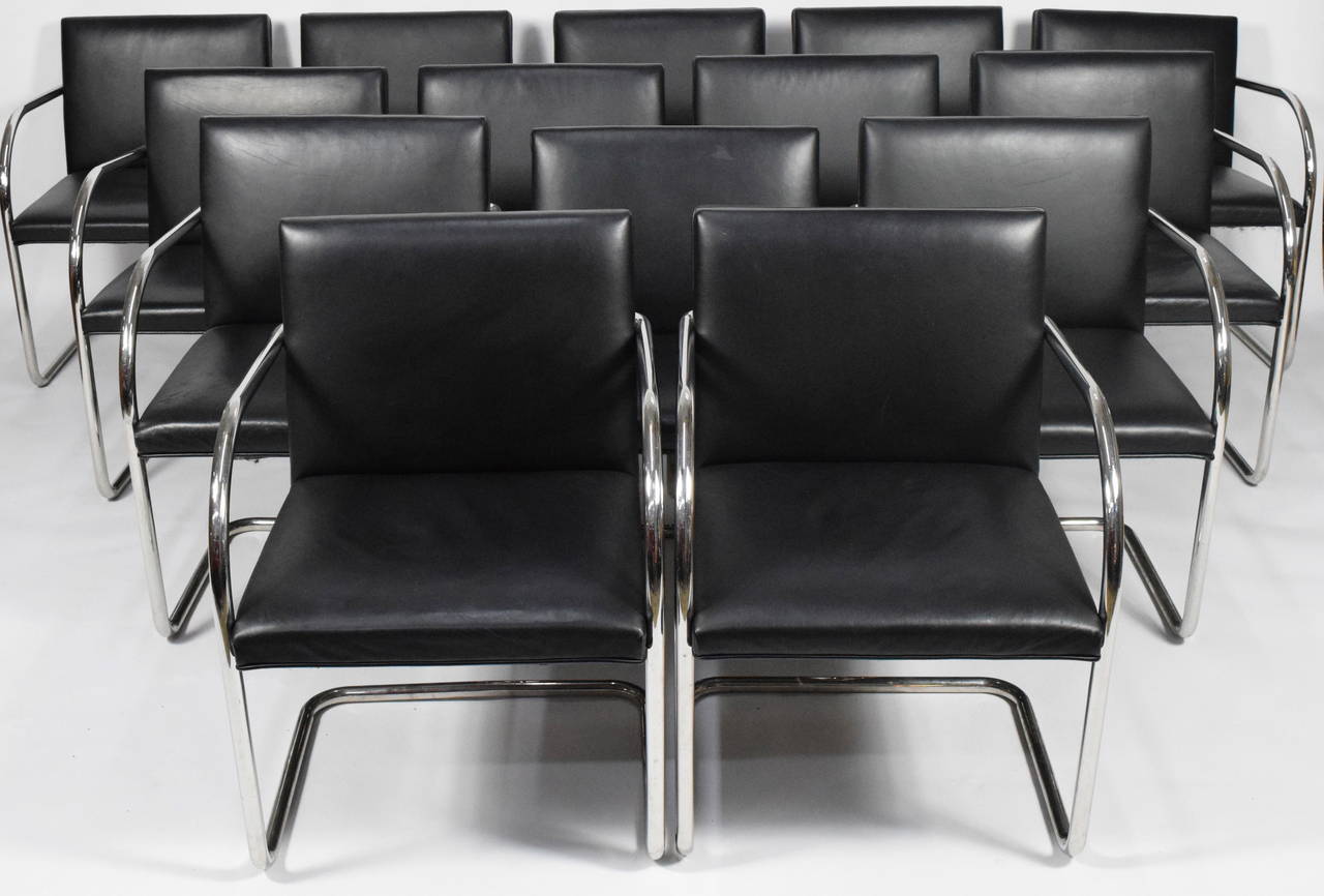 We have 14 Brno chairs by Mies van der Rohe for Knoll. They are a chrome frame with black leather seats. The chrome is very nice and the leather is in very good condition. These are being sold in pairs.