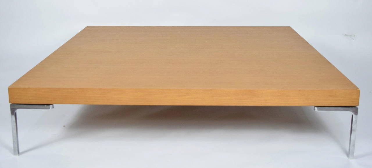 Oak veneered low coffee table by Antonio Citterio. Called the Charles. Aluminum legs.