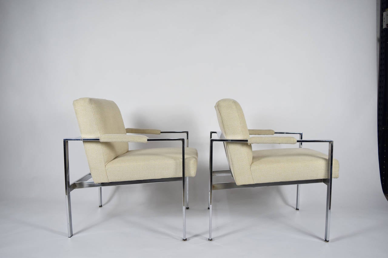 A really nice pair of Milo Baughman chrome frame lounge chairs in a neutral fabric.