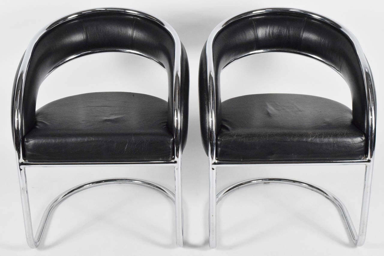 Pair of Anton Lorenz for Thonet lounge chairs. Chairs are in black leather with a chrome frame.
