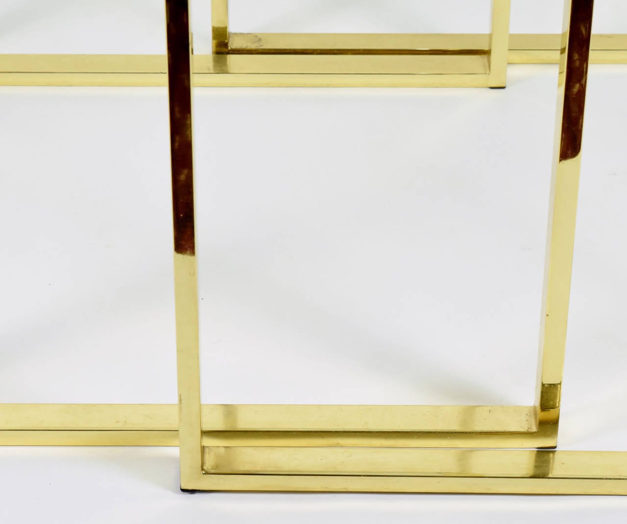 Pair of Brass and Glass Modernist Nesting Tables 1