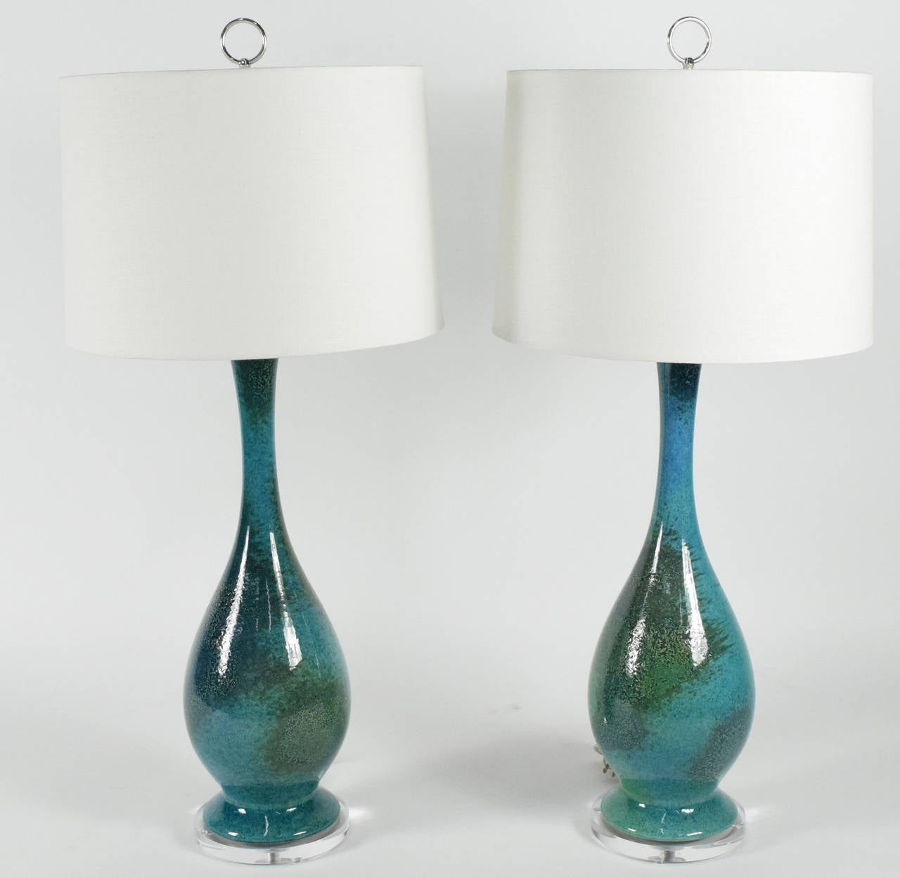 This is a beautiful pair of glazed lamps with shimmery gold glazing, they stand tall and have been rewired with acrylic bases added.