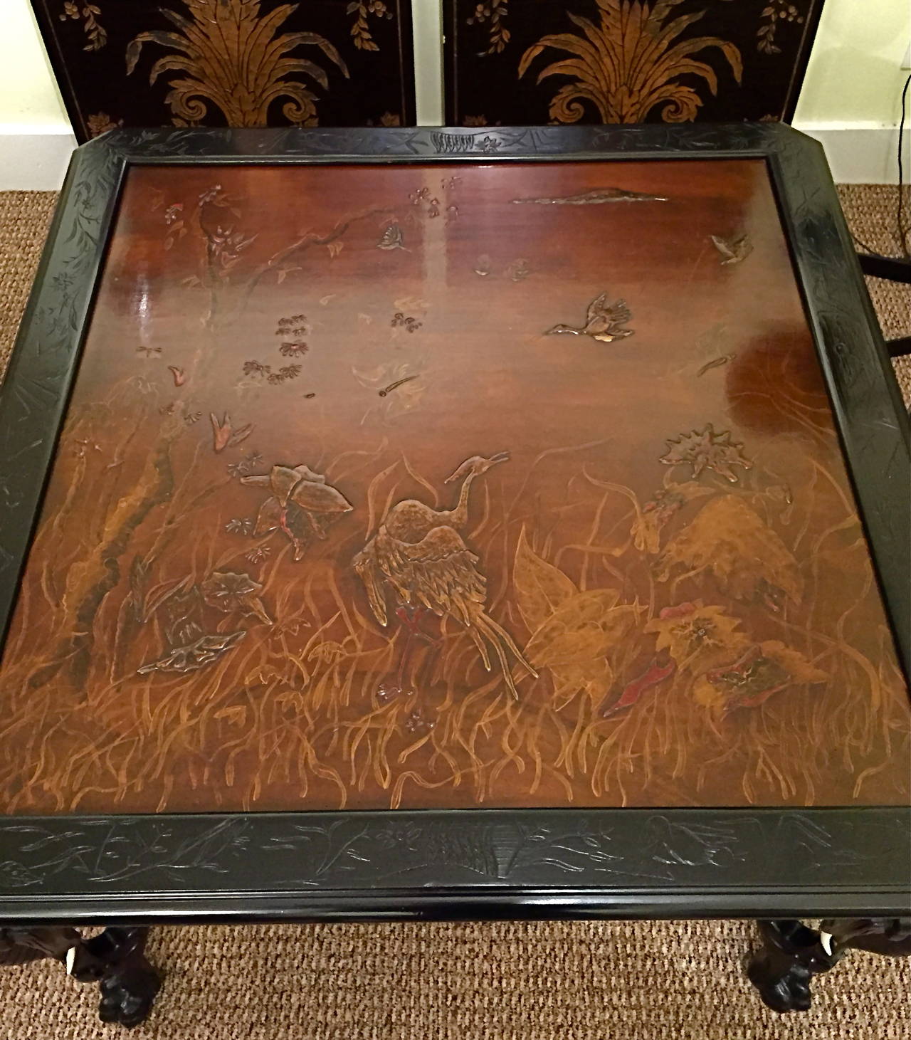 Late 20th Century Eclectic Center Table with Elephant-Form Legs and High Relief Decorated Top For Sale