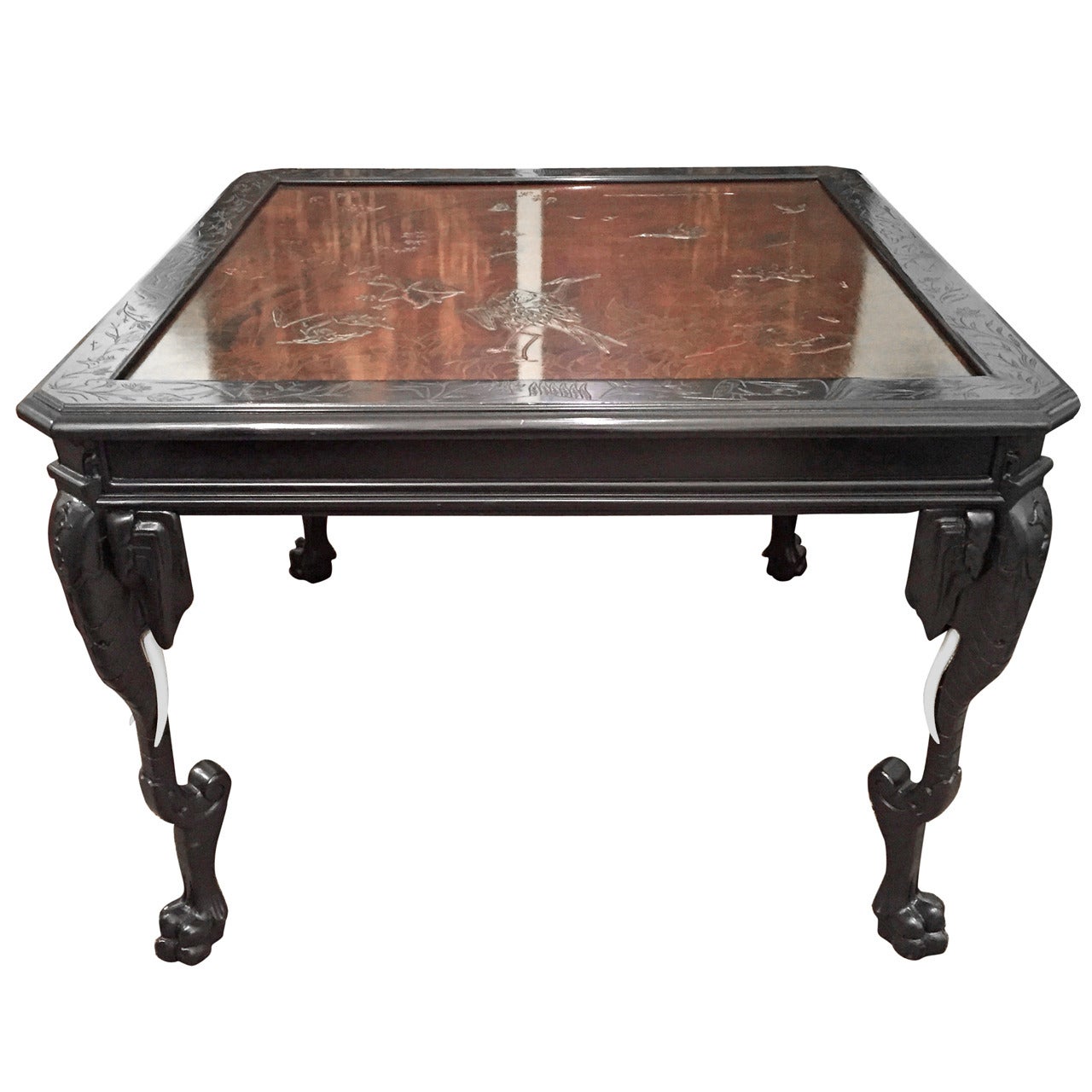 Eclectic Center Table with Elephant-Form Legs and High Relief Decorated Top For Sale