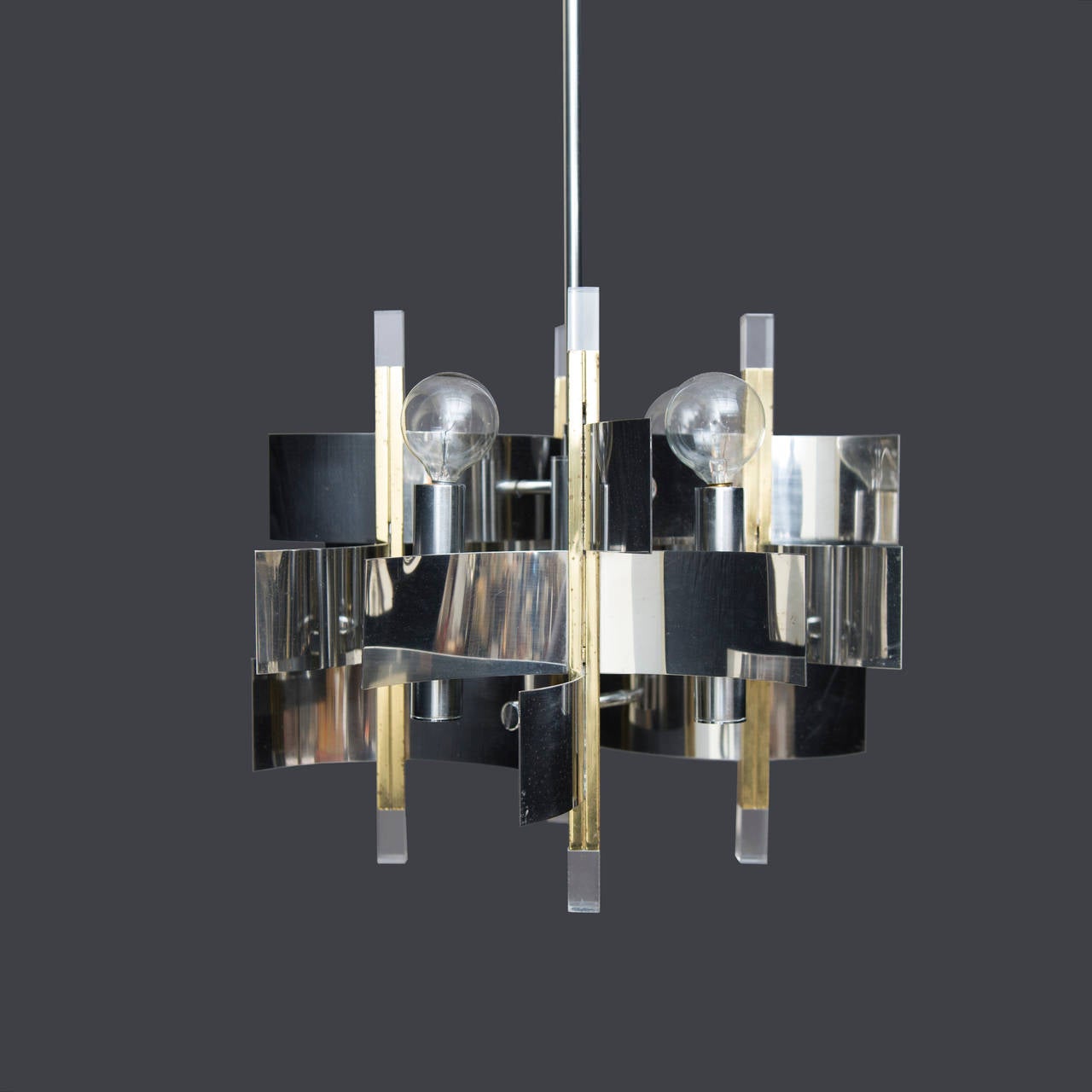Lucite and mixed metal Gaetano Sciolari chandelier - an intriguing design with a Brutalist flair