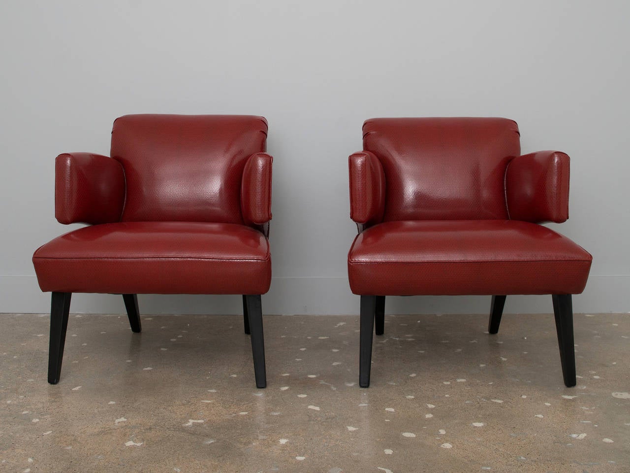 Highly unusual lounge chairs from the 1940s or 1950s.  Recently recovered in vinyl; very similar to the original fabric.  Graceful lines - we've never seen anything like them!
