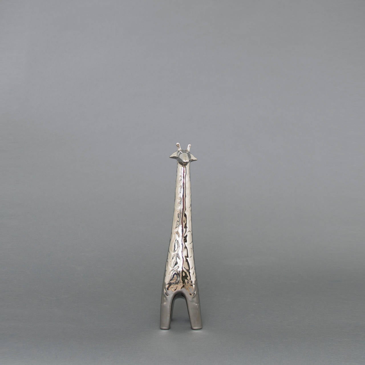 Jaru metallic silver giraffe from the 1970s - makes a great addition to a discerning interior.