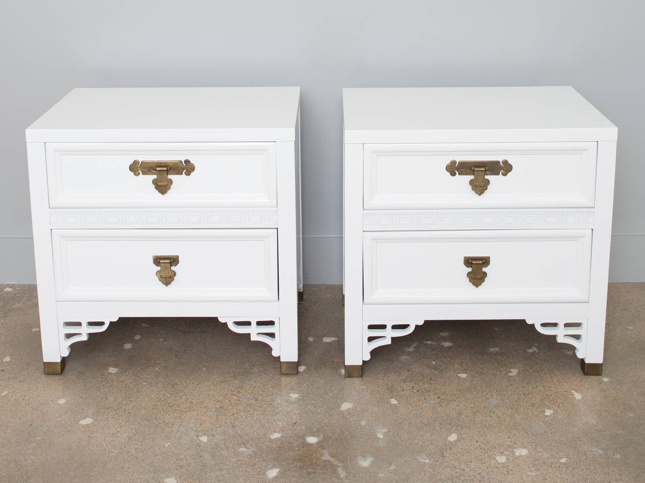 Pair of Shangri La nightstands lacquered in white high gloss. Perfect bedroom nightstands or end tables in a sun-filled room.