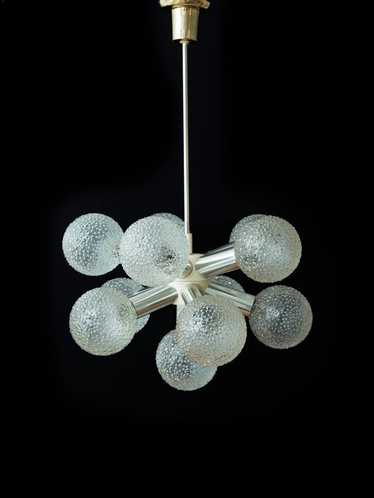 Pair of stunning chrome mod chandeliers from Germany. Textured globes add to the beauty (2 available).