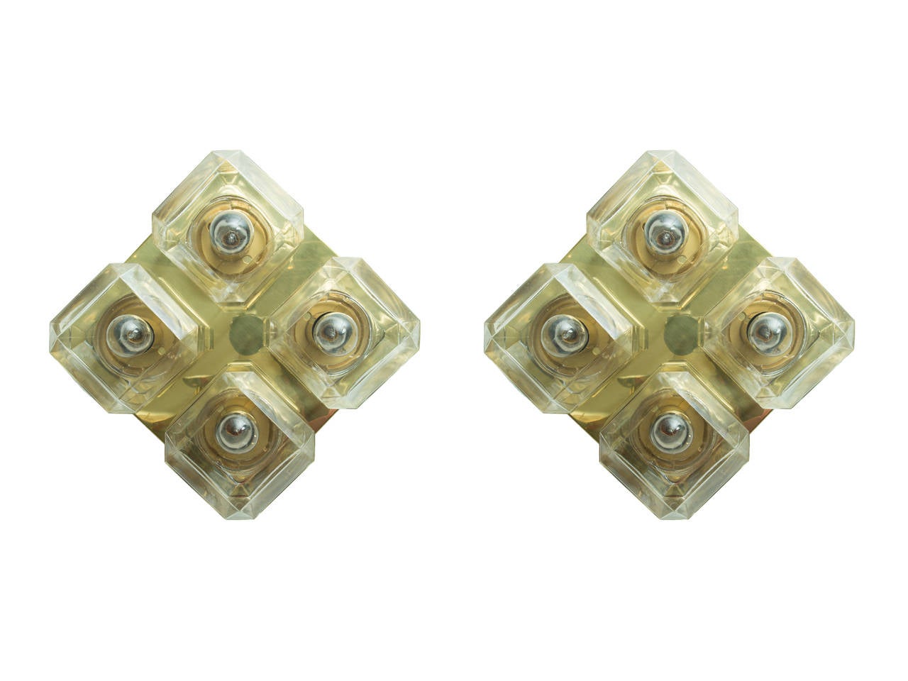 A pair of 4 globe glass and brass mod wall or celling mount light fixtures.