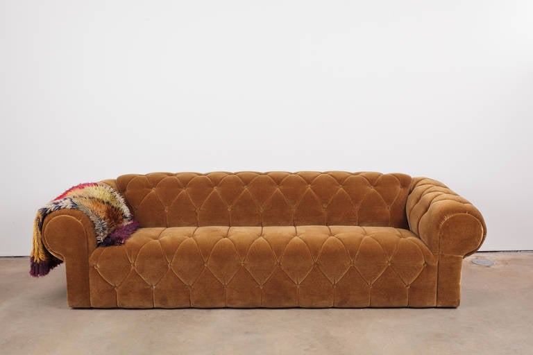 Beautiful tufted chesterfield reupholstered in burnt sugar Donghia mohair. A stunning example of a Mid Century teddy bear couch.