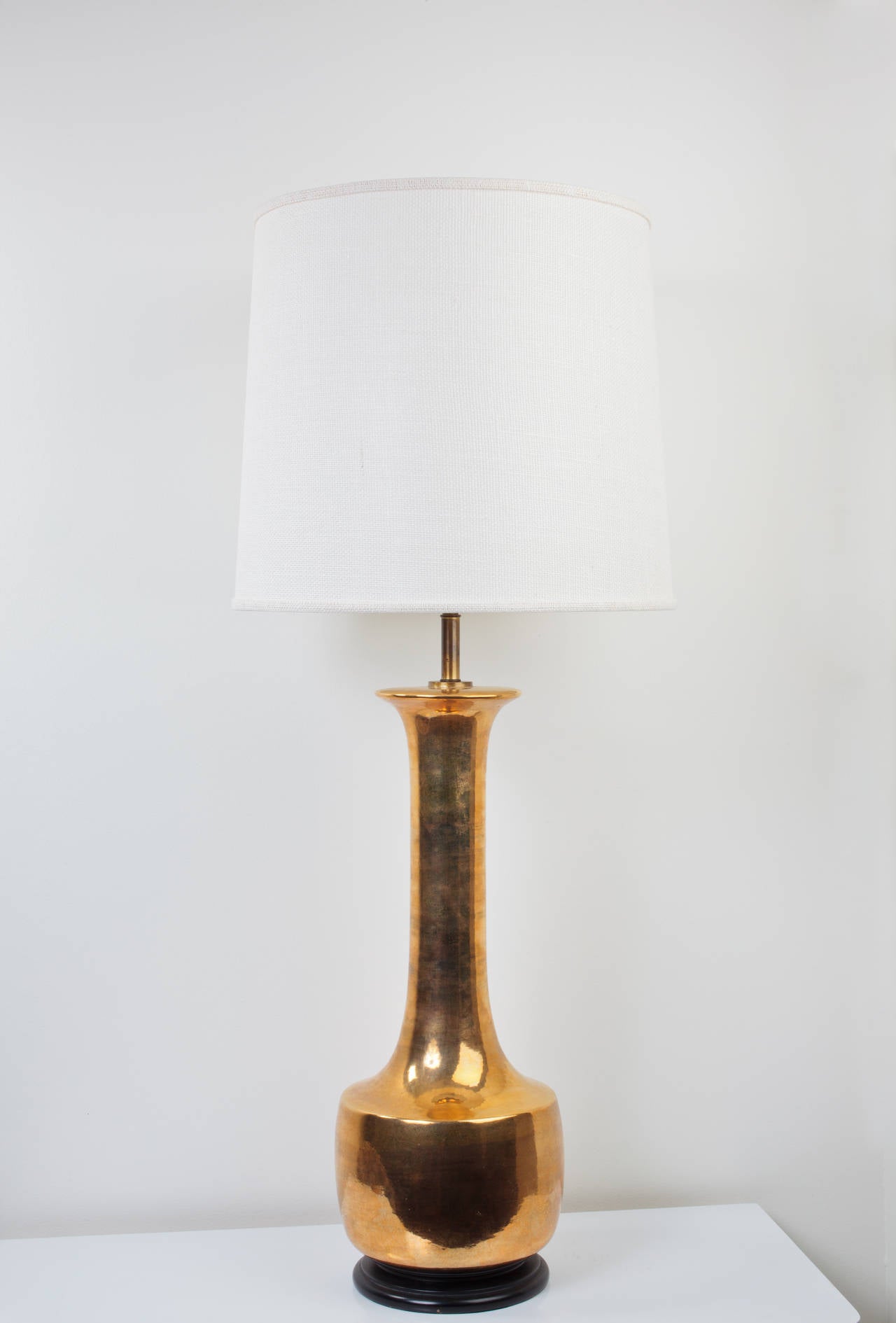 Large Mid Century metallic gold glazed sofa table lamp with new shade and wiring.