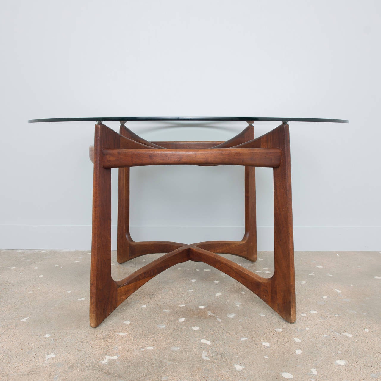 Beautiful glass top dining table by Adrian Pearsall for Craft Associates.  Table is in great vintage condition. Original glass is included but base can fit a much larger piece of glass.