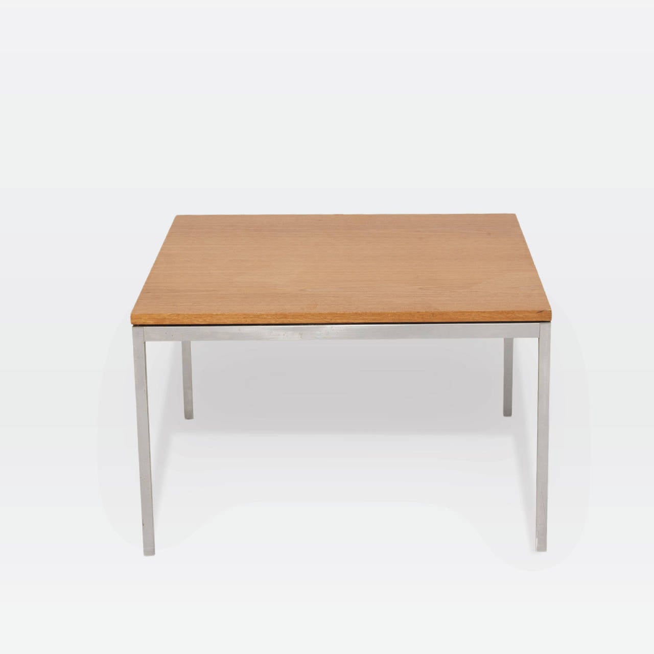 Florence Knoll square coffee table with original walnut top on brushed steel base. Original early label underneath.
