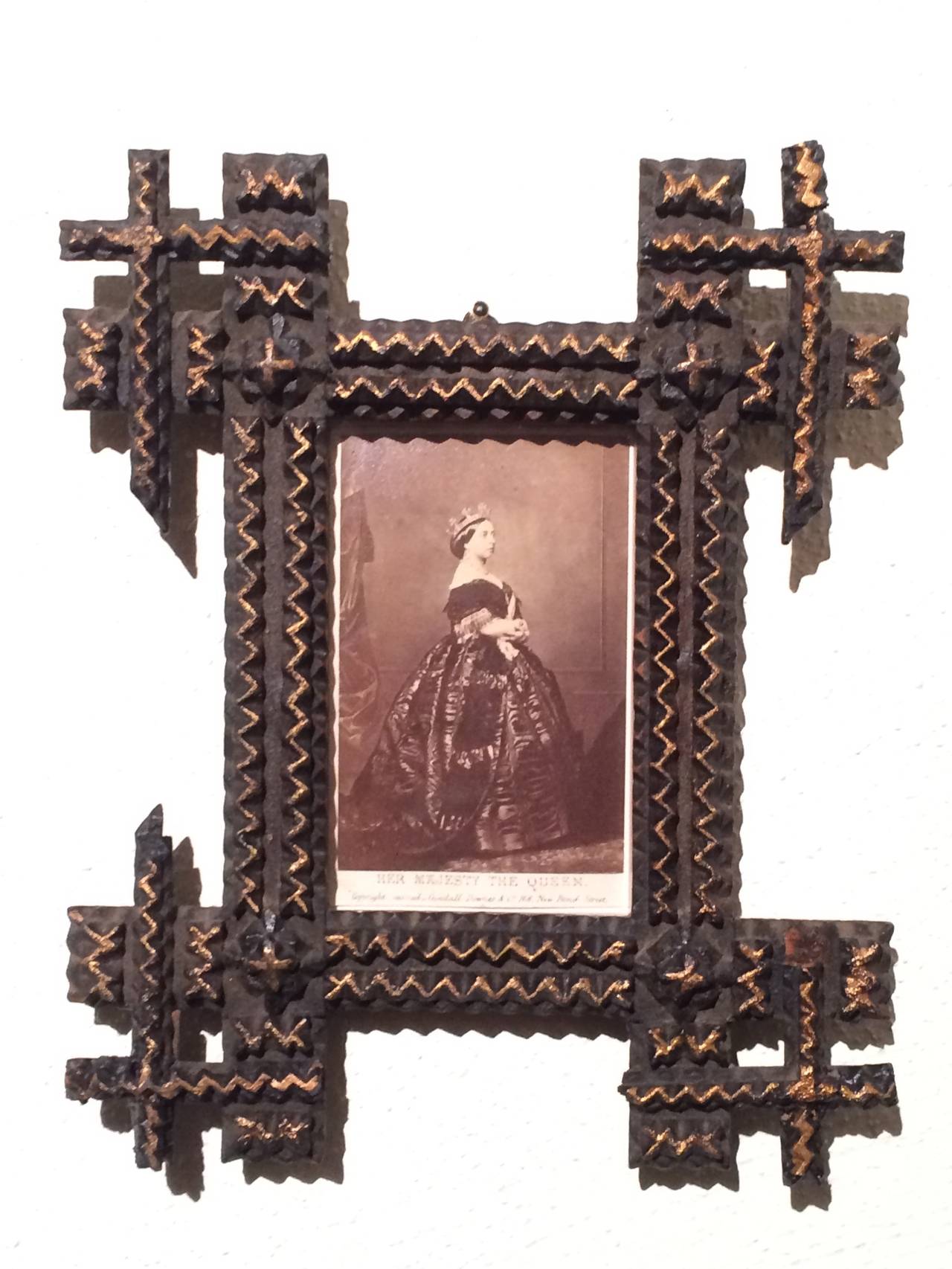 Pair of Tramp Art frames with sepia photographs, 