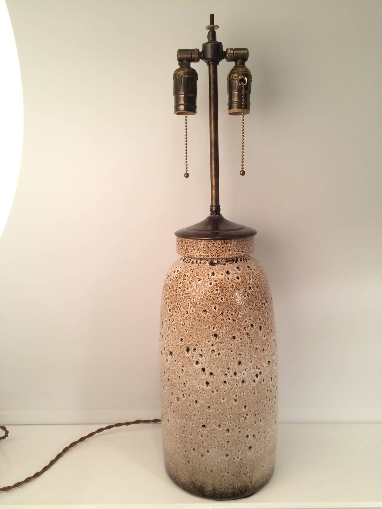 Beautifully glazed Scheurich West German Pottery vase mounted as a lamp. Double cluster socket with pull chains and a brown twisted silk cord.
Germany, 1960s.

Dimensions: Vase height is 15