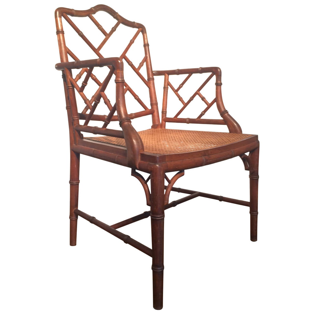 A Chinese Chippendale faux bamboo armchair with canned seat, America, circa 1950.
