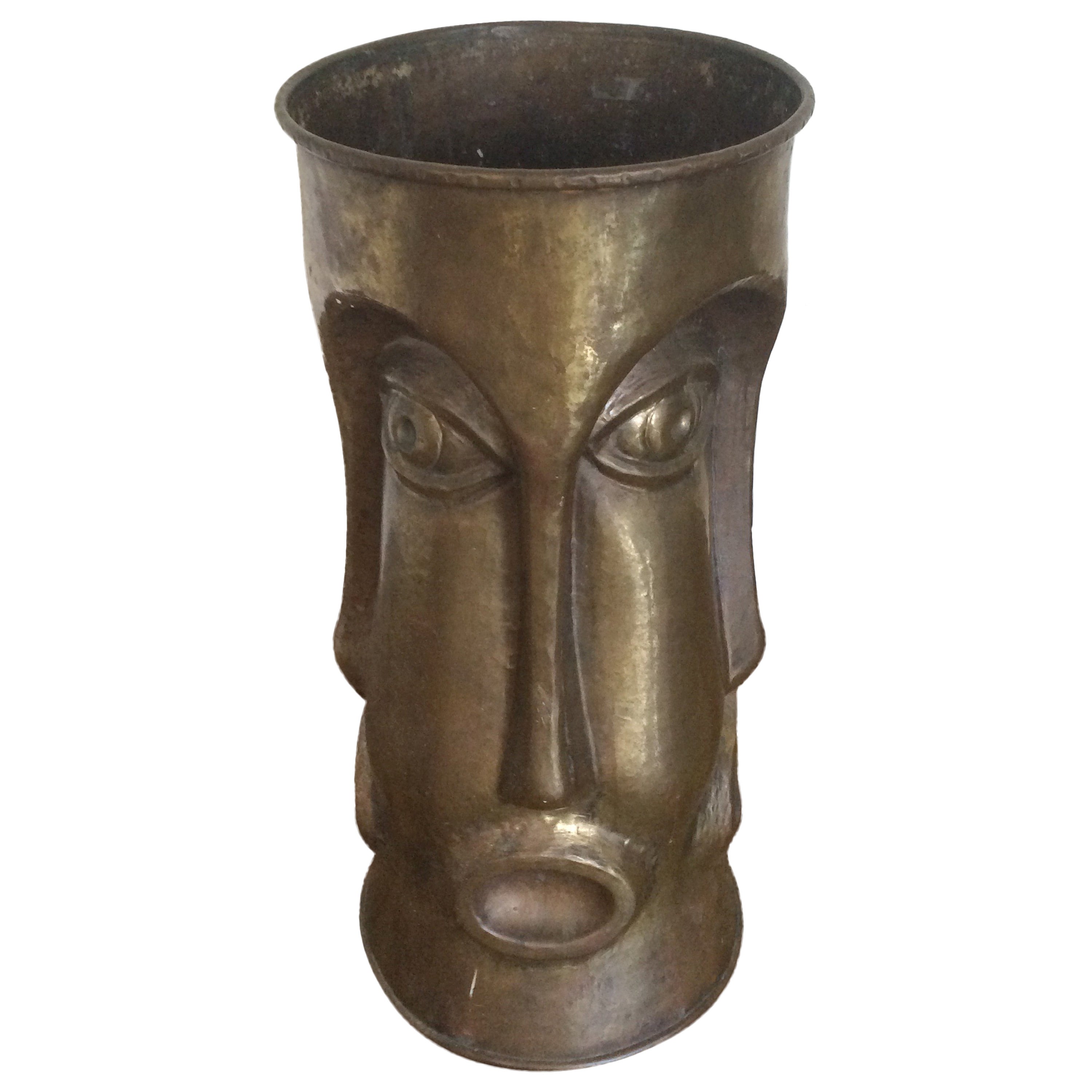 Italian Brass Umbrella Stand with Repeating Face Motif, 1960's.