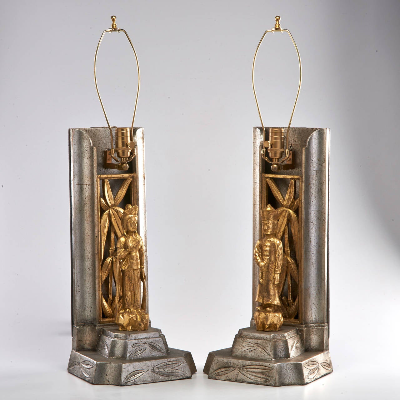 James Mont figural table lamps in the Asian style.
Silvered and giltwood-newly rewired.
New York, 1960s.