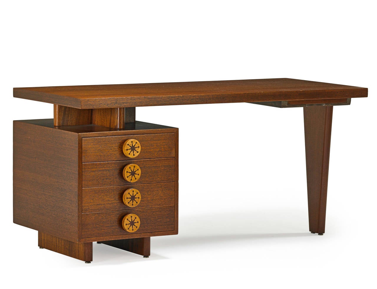 Andrew Szoeke desk manufactured by Andrew Szoeke and Associates, USA, circa 1950, mahogany with birch inlay. Desk features four drawers and one pull-out writing surface. 

Andrew Szoeke immigrated to the United States From Vienna in 1921 and