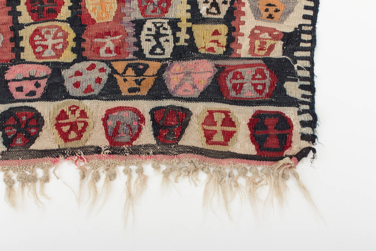 An unusual tribal Turkish Anatolian kilim with 144 Elibelinde symbols, in
different colors and everyone in a different style. This small and unusual piece
was made from a confident woman, using only the powerful women symbol.
Elibelinde (Turkish