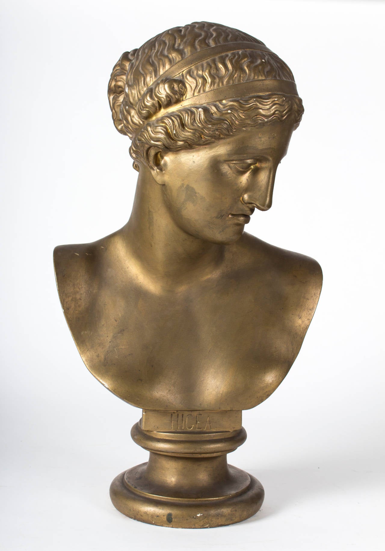HYGIEIA was the daughter of Asklepios, goddess of health and patron saint of
pharmacists.

Gold painted plaster, inscribed on base „HIGEA“.