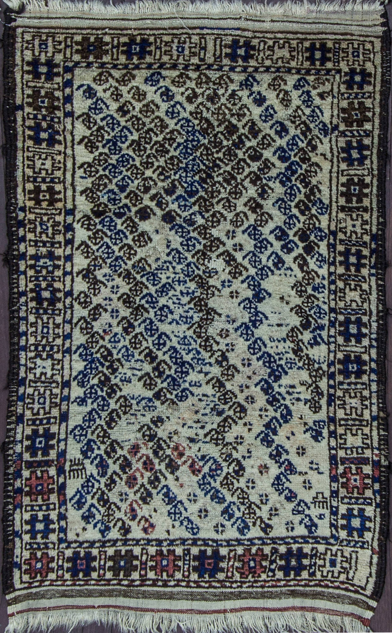 Belouch rugs rather than originating from one specific area and they have wide range of styles. But a distinct style of itself. The historical region of Baluch rugs is Baluchistan, is no longer an independent, autonomous region. Today, this