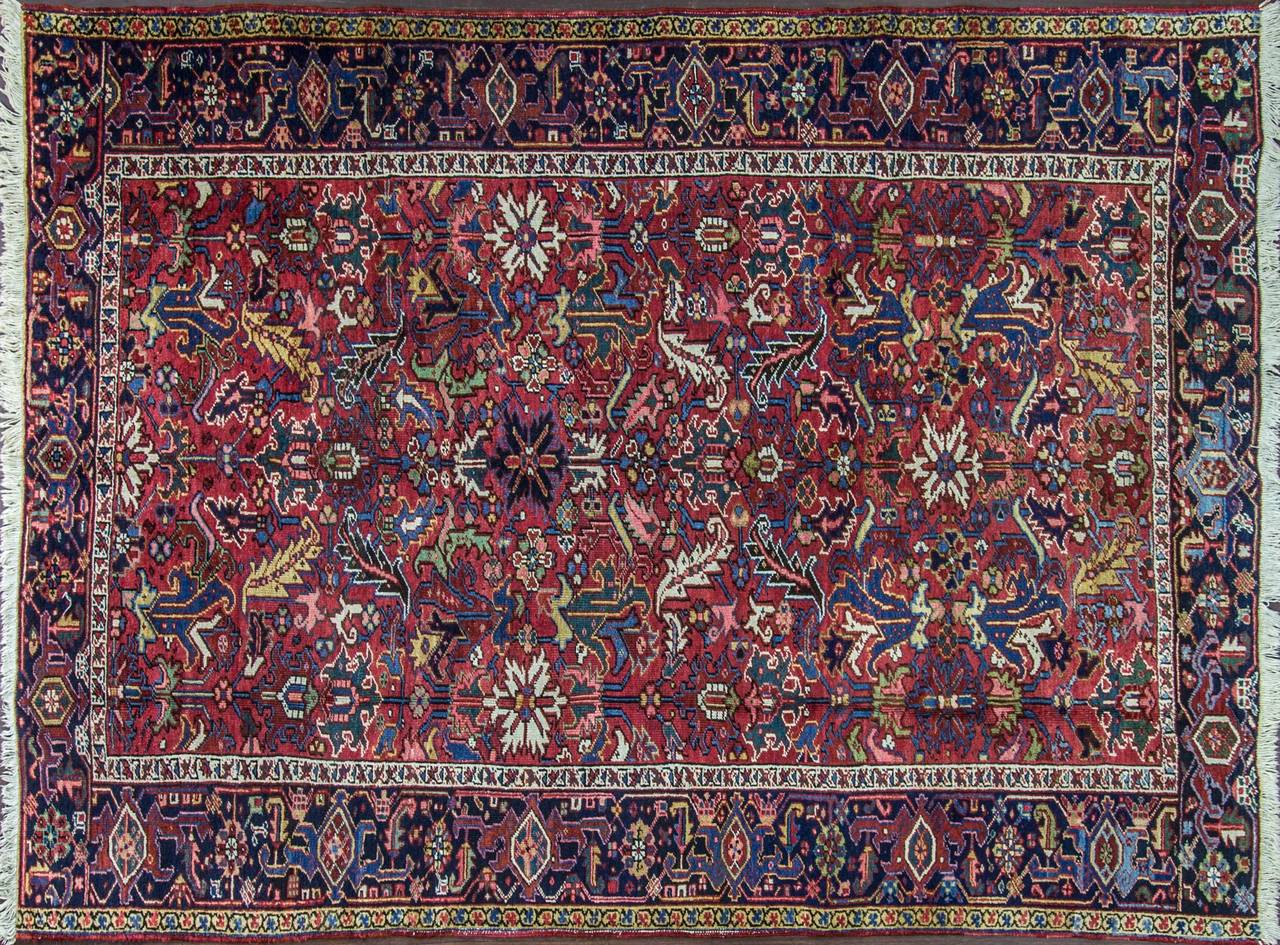 Natural wool dues, the multi colors are amazingly beautiful, mostly like antique Serapi.
Charming all over design with geometric motives.
Heriz rugs are Persian rugs from the area of Heris, East Azerbaijan in northwest Iran, northeast of Tabriz.